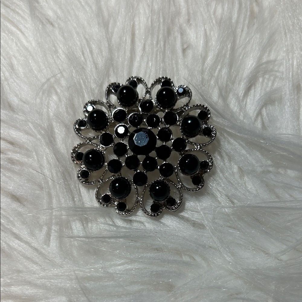 Elegant Black and Silver Brooch